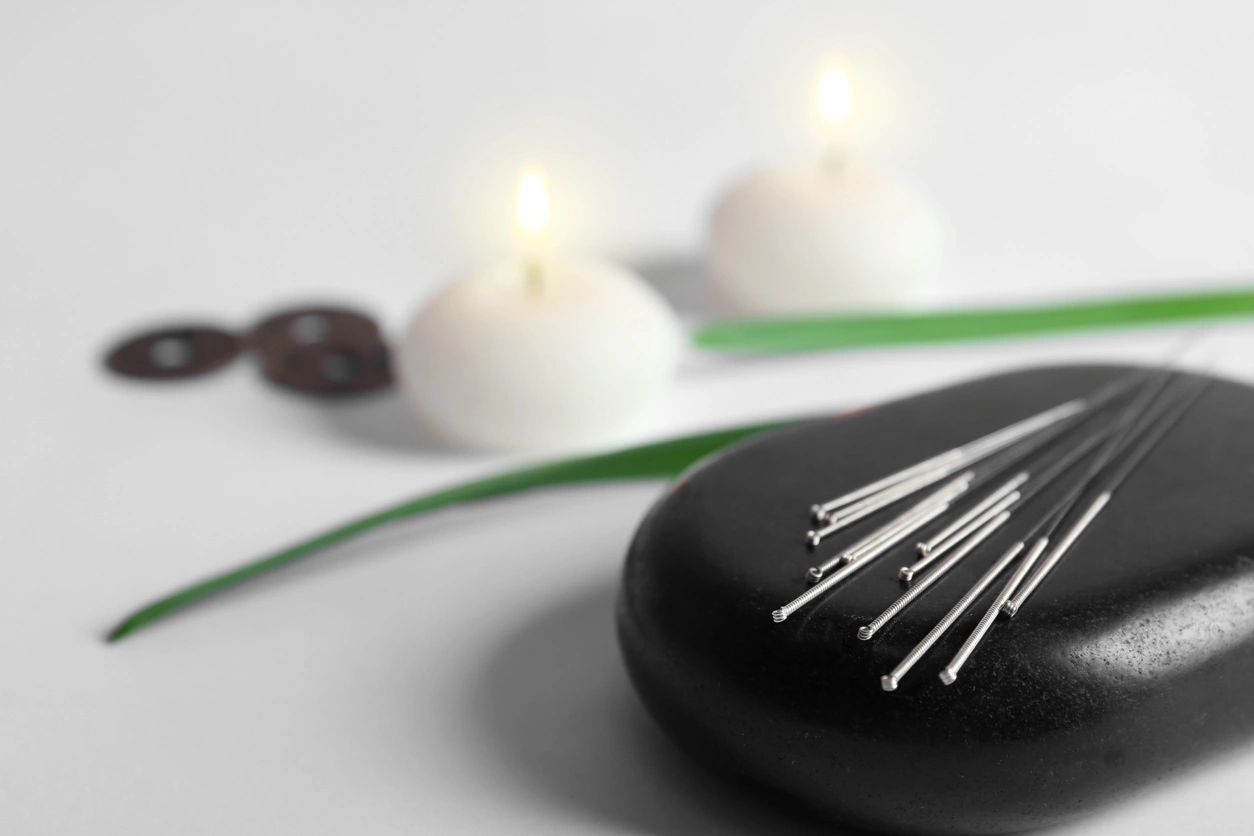 A close up of some candles and needles